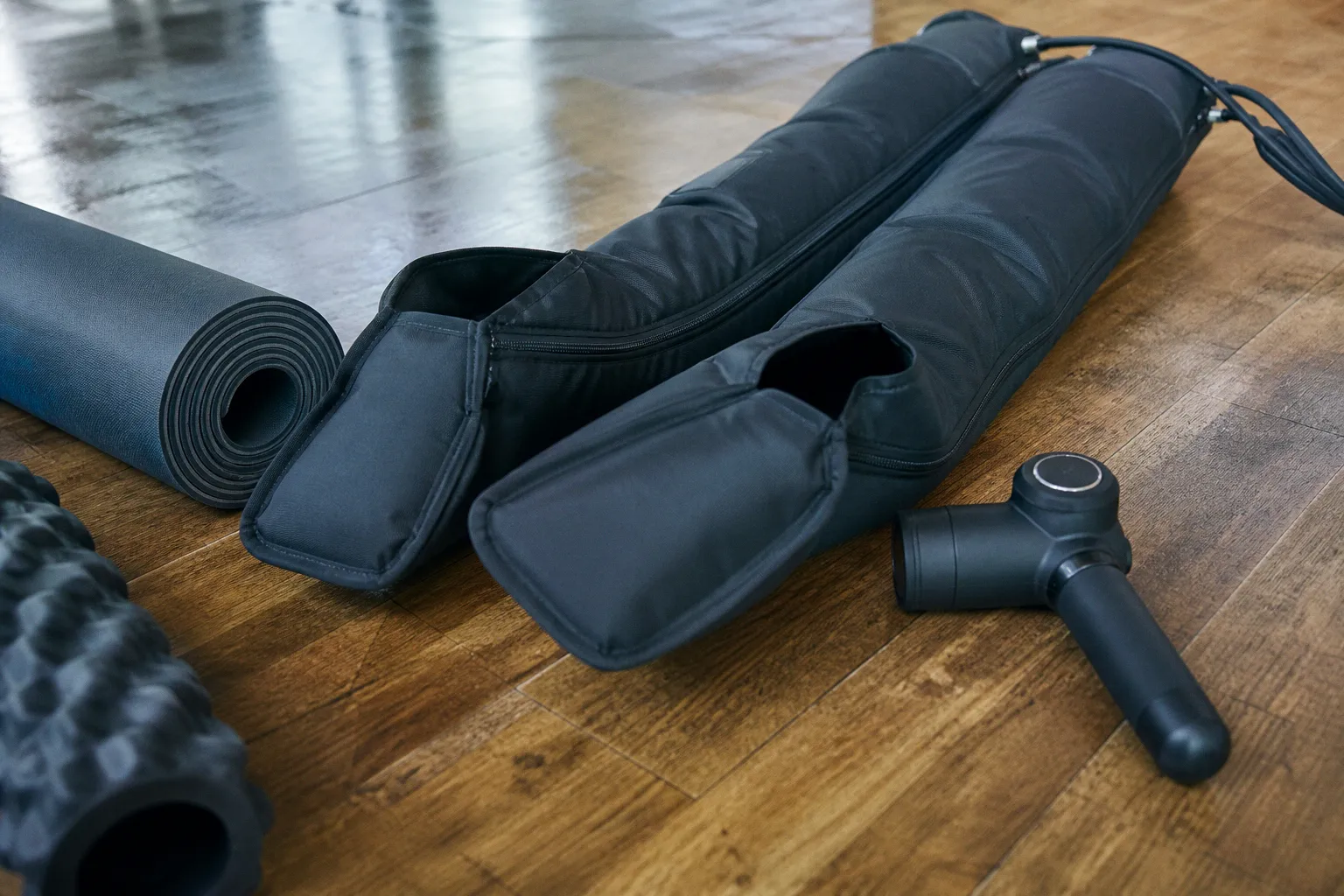 Massage guns or compression boots: the best recovery approach